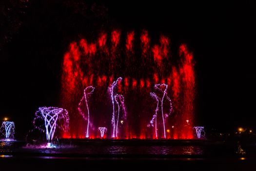 Colorful musical fountain in Margaret Island, Budapest, Hungary at night
