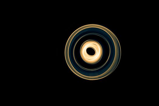 Glowing abstract curved blue and yellow lines.