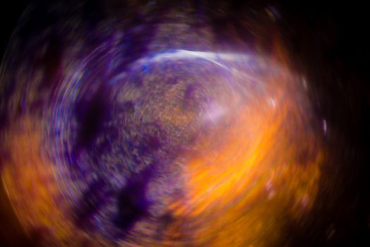 Abstract background blur color spin pattern.