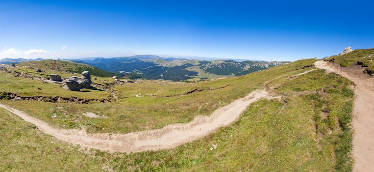 Panoramic view of Mount Bucegi on summer, part of the Carpathian Range from Romania