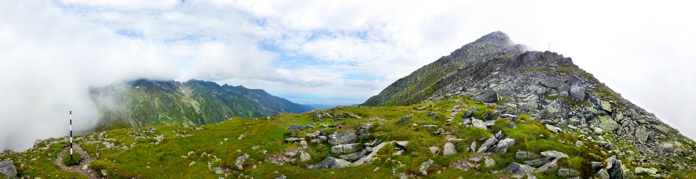 Panoramic view of Fagaras Mountain on summer, part of the Carpathian Range, Romania - path to Negoiu peak