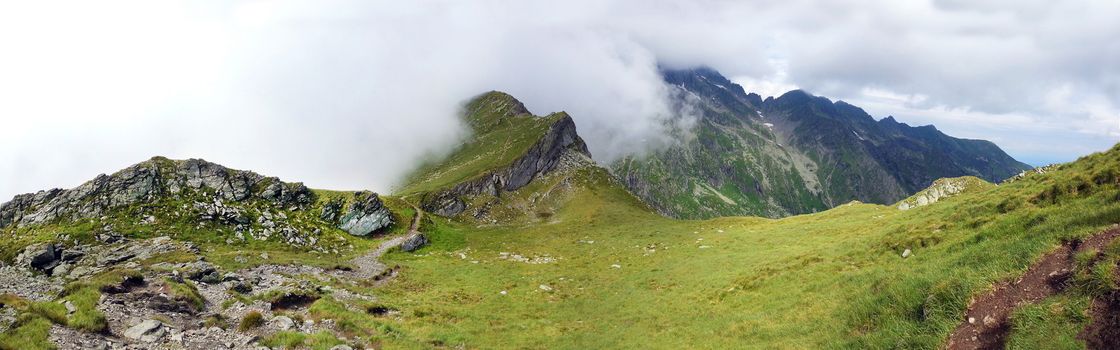 Panoramic view of Fagaras Mountain on summer, part of the Carpathian Range, Romania - path to Negoiu peak