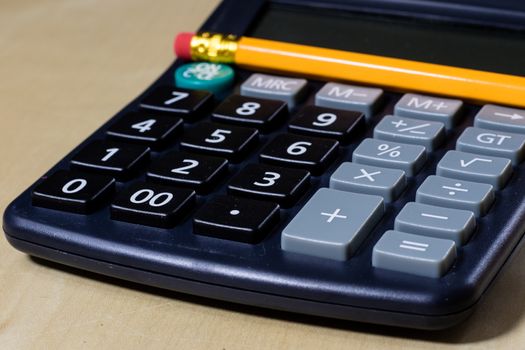 Bills, documents and papers with calculator. Office of the accounting office. Wooden table.