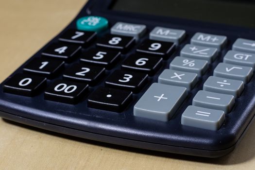 Bills, documents and papers with calculator. Office of the accounting office. Wooden table.