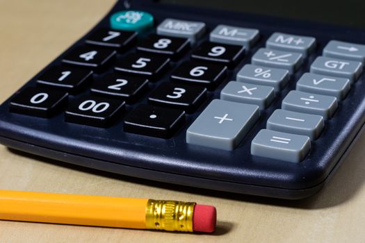 Bills, documents and papers with calculator. Office of the accounting office. Wooden table.