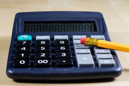 Bills, documents and papers with calculator. Office of the accounting office. Wooden table.