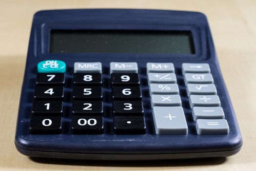 Bills, documents and papers with calculator. Office of the accounting office. Wooden table.