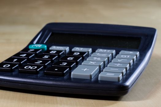 Bills, documents and papers with calculator. Office of the accounting office. Wooden table.