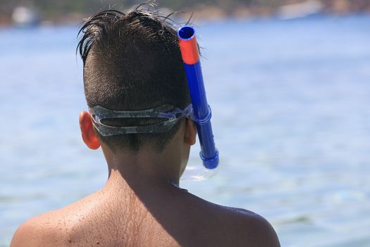 Boy with snorkeling mask