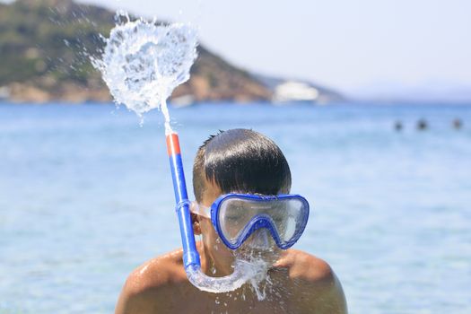 Boy with snorkeling mask