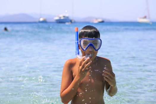 Boy with snorkeling mask