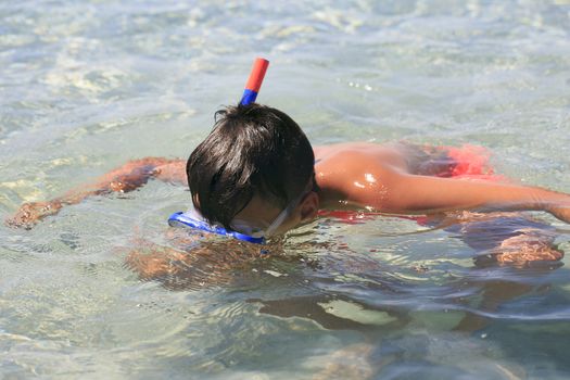 Boy with snorkeling mask