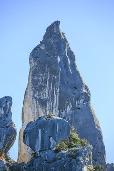 coast of Sardinia . Rocks on the beach