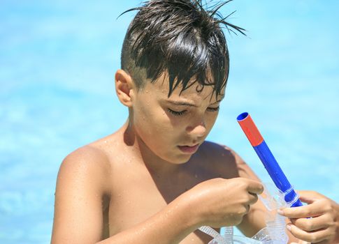 Boy with snorkeling mask