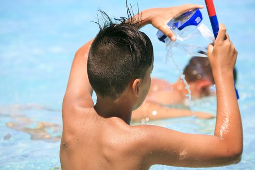 Boy with snorkeling mask