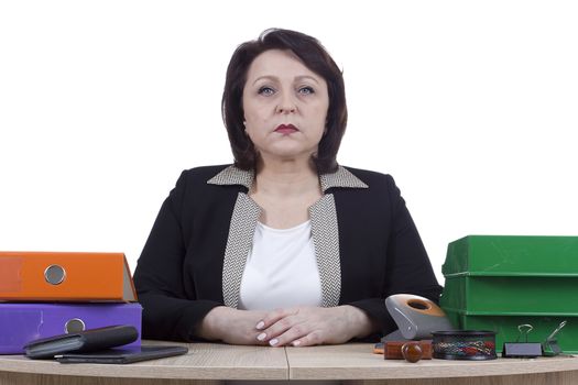 Business woman at the desk on a white background