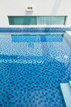 detail image of swimming pool in modern house outdoor.