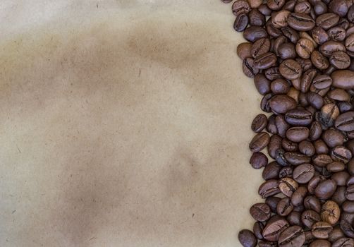 Coffee beans on a vintage paper background