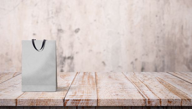 paper bag for shopping on a wooden background