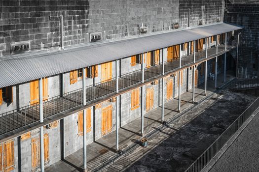 A geometric picture of windows, columns and walls of an ancient fortress in Port Louis, Mauritius island.Vintage style and minimalist.