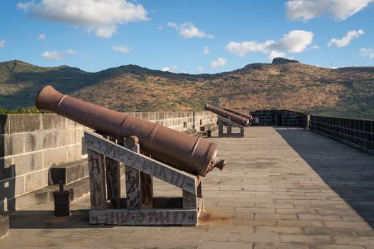 Nice view of cannons in older fortress located in Port Louis, Mauritius