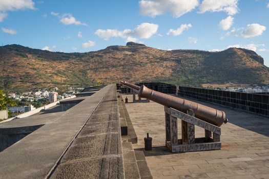 Nice view of cannons in older fortress located in Port Louis, Mauritius