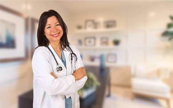 Female Hispanic Doctor or Nurse Standing in Her Office.