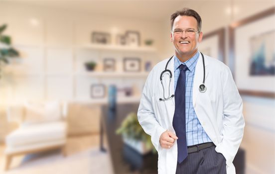 Handsome Doctor or Nurse Standing In His Office.