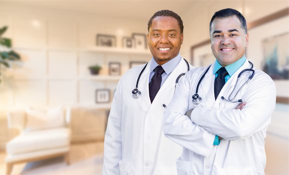 African American and Hispanic Doctors or Nurses Standing in Office.