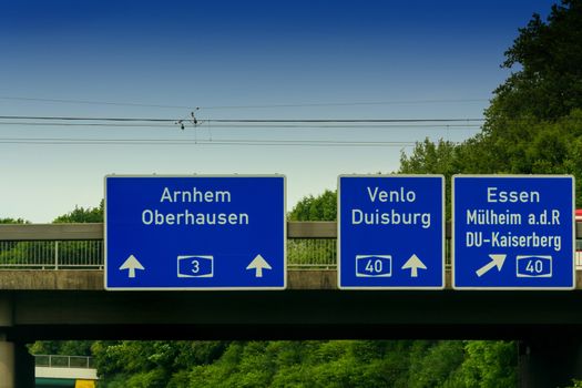 Highway sign, directional sign on the motorway A 3, direction Venlo, Duisburg, Essen, Muelheim an der Ruhr, Oberhausen, Arnhem and Highway crossing Kaiserberg.
