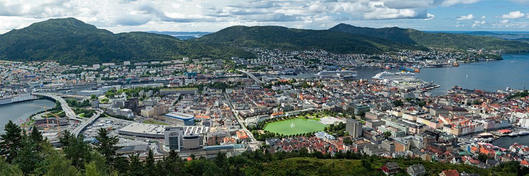 Panoramic top view of the city of Bergen with mountains on background, Norway