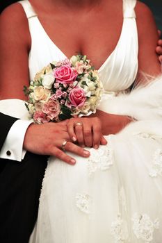 The groom keep the bride for hands