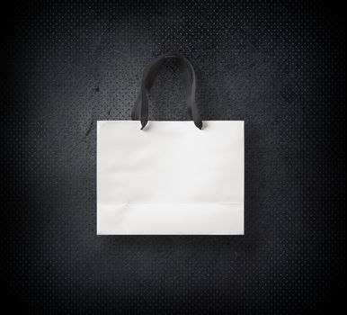 paper bag for shopping on a dark background