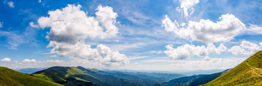 gorgeous cloudscape over the mountain ridge tops. amazing summer scenery in carpathian mountains