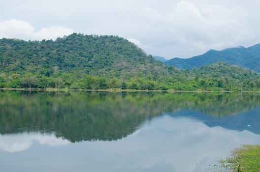 moutain view of national park in thailand and have shadow in the lake.