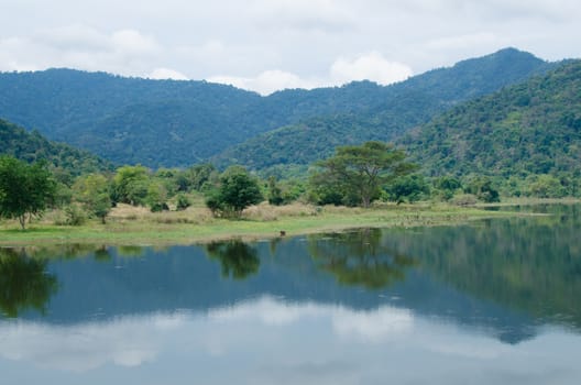 moutain view of national park in thailand and have shadow in the lake.