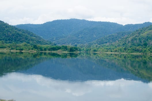 moutain view of national park in thailand and have shadow in the lake.