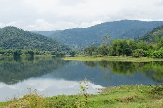 moutain view of national park in thailand and have shadow in the lake.