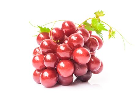 Ripe red grape with leaf on white background, fruit healthy concept