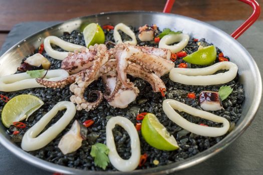 black rissoto with squid and ink sauce.