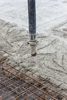Pipe with concrete - construction site.