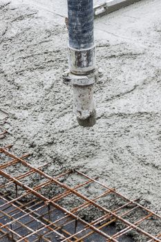 Pipe with concrete - construction site.