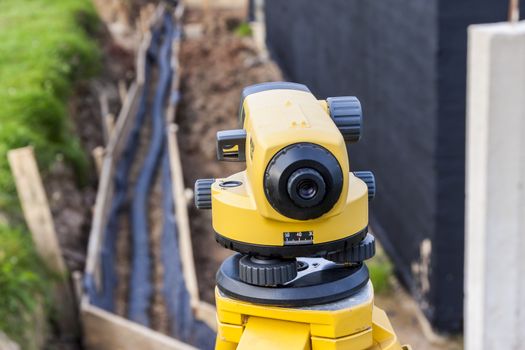 Surveyor equipment optical level at construction site