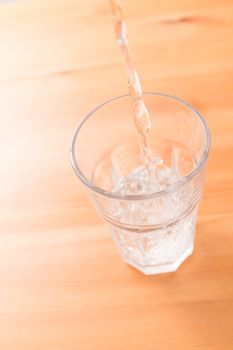 Water pouring in glass