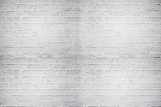 dirty white brick background.