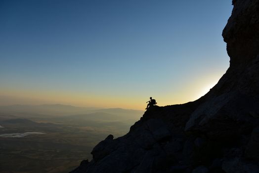 watching the scenery at the summit climber