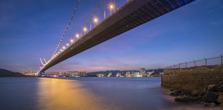 Sunset Under The Tsing Ma Bridge Of Hong Kong