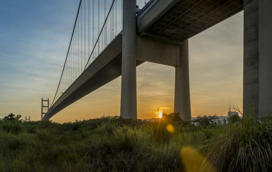 Sunset Under The Tsing Ma Bridge Of Hong Kong