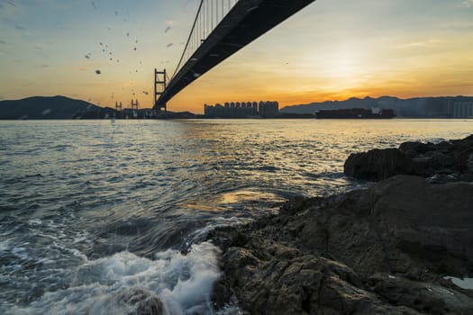 Sunset Under The Tsing Ma Bridge Of Hong Kong