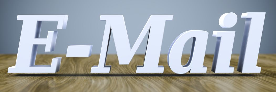 3d rendering of the word E-Mail on a wooden table